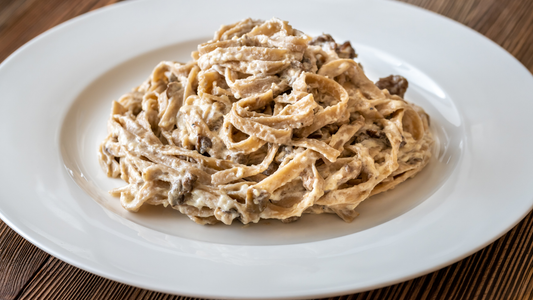 Tagliatelle con funghi porcini e Salsa al parmigiano con tartufo bianco