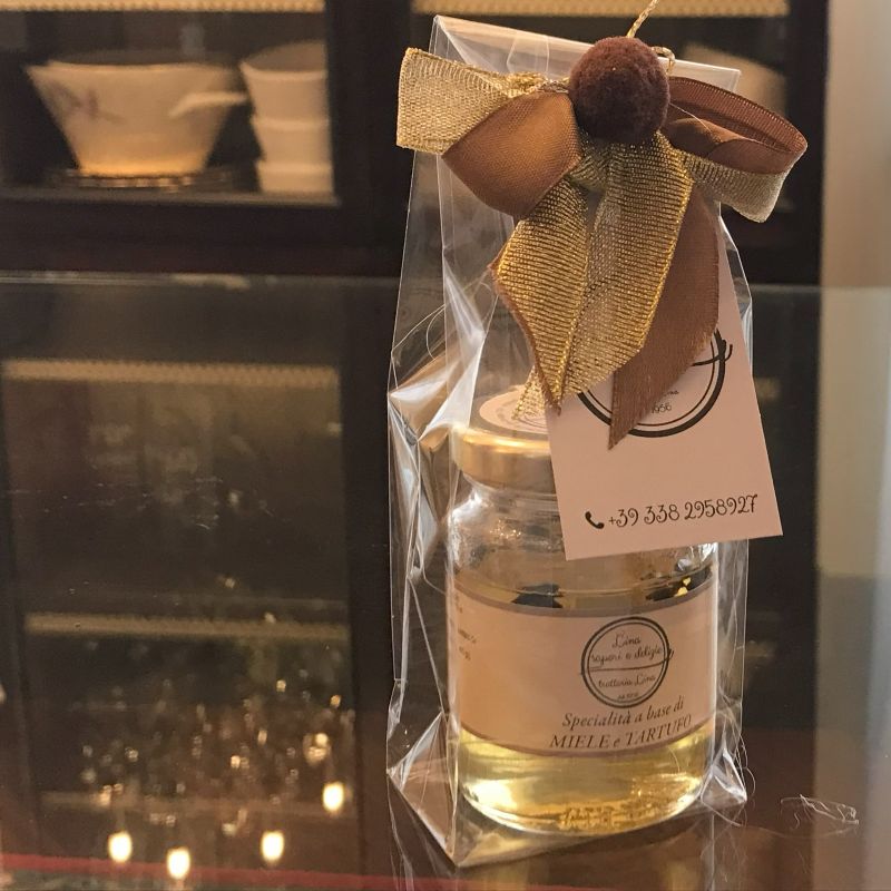 Confezione regalo in sacchetto trasparente e fiocchetti di miele al tartufo Lina Sapori e Delizie