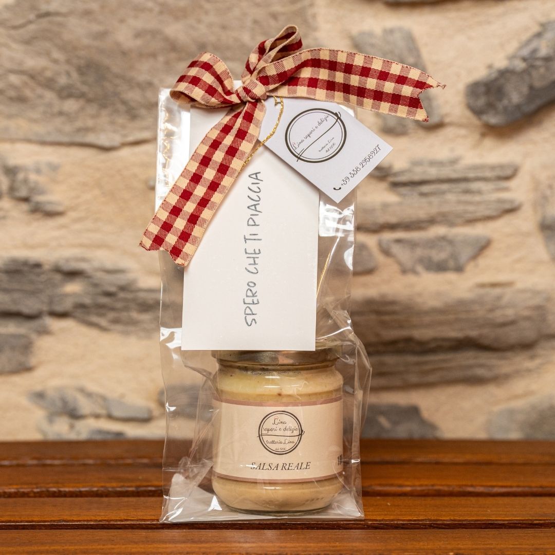 Confezione regalo in sacchetto trasparente con fiocco e tag "spero che ti piaccia" di salsa reale Lina Sapori e Delizie